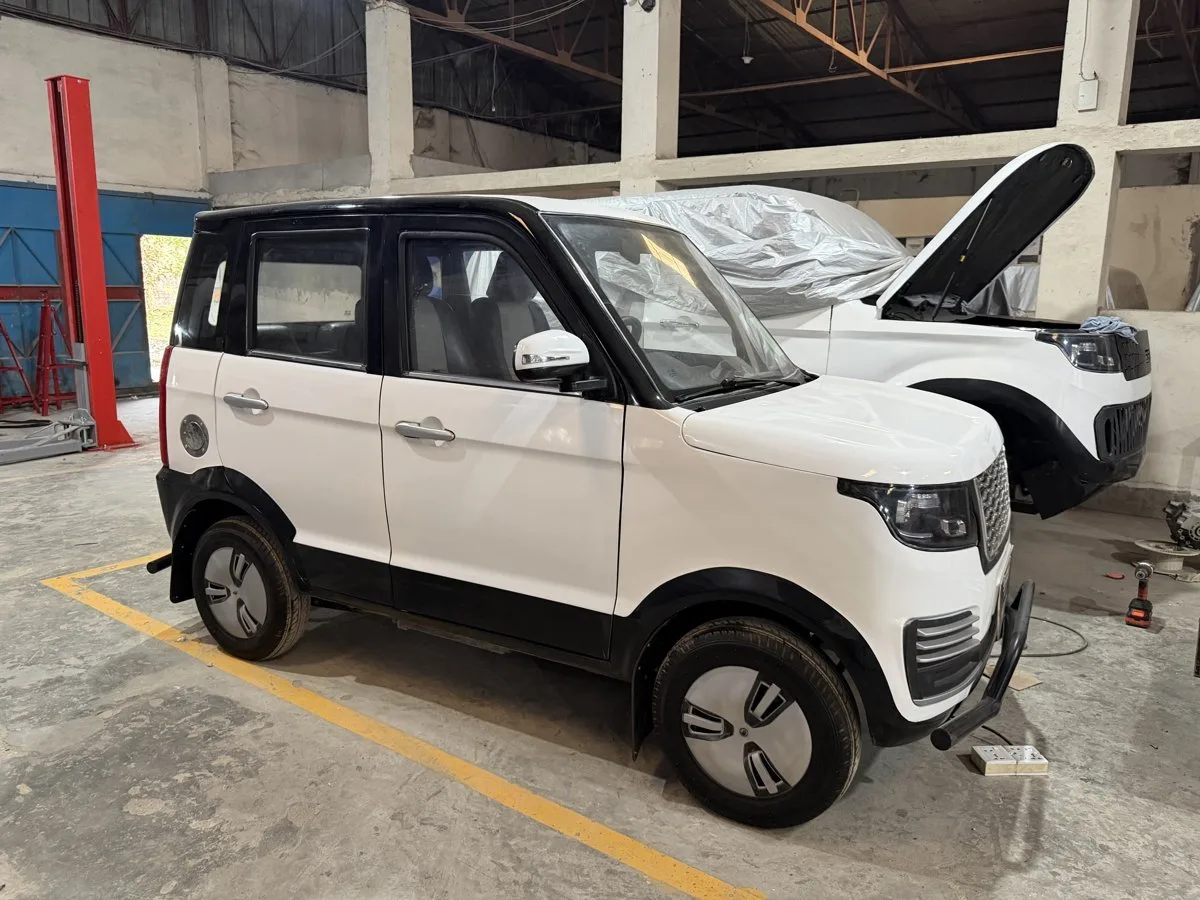 V2 assembly — hood open